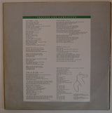 Friends Again : Trapped And Unwrapped (LP, Album)