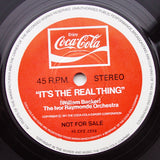 The New Seekers / The Ivor Raymonde Orchestra* : Buy The World A Coke / It's The Real Thing (7", Mono, Promo)